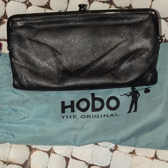HOBO Handbags - HOBO " The Original" Shimmering Black Leather Clutch And Dust Bag !